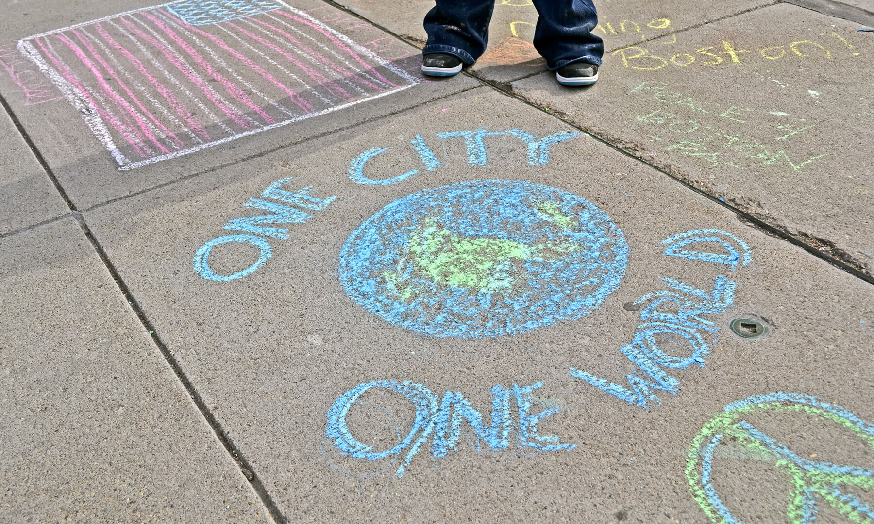 One City One World sidewalk chalk - activism - art - diversity - unity