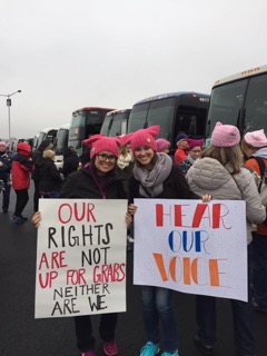 Holding signs at the Women's March