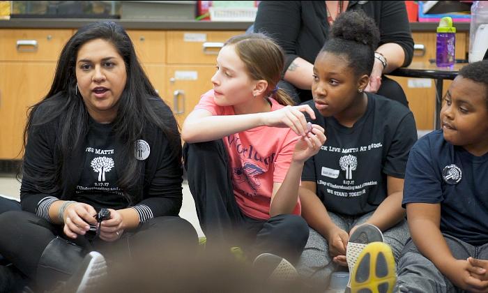 A teacher at Rochester City School district leads discussion with her students.