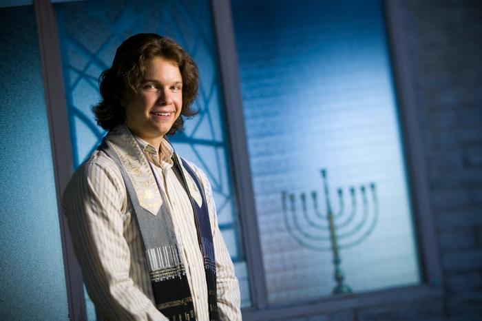 Johansen High senior Edward Zeiden's tallit, or prayer shawl, has four tzitzit, a knotted fringe, at each of its corners as explicitly commanded in the Torah.