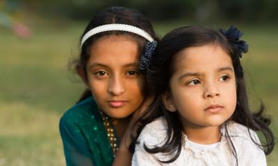 girls looking pensive outdoors