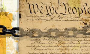 Chains superimposed over an image of the United States Constitution.