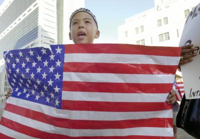 Student holding a US flag