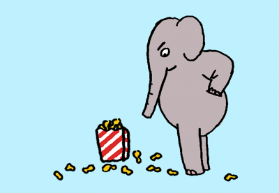 Elephant looking disapprovingly at a box of peanuts on the ground