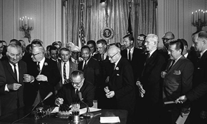 photo of the signing of the Civil Rights Act of 1964