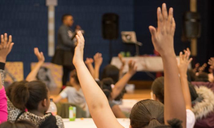 Raised Hands | Love Your Magic Conference | Teaching Tolerance Grantee Project