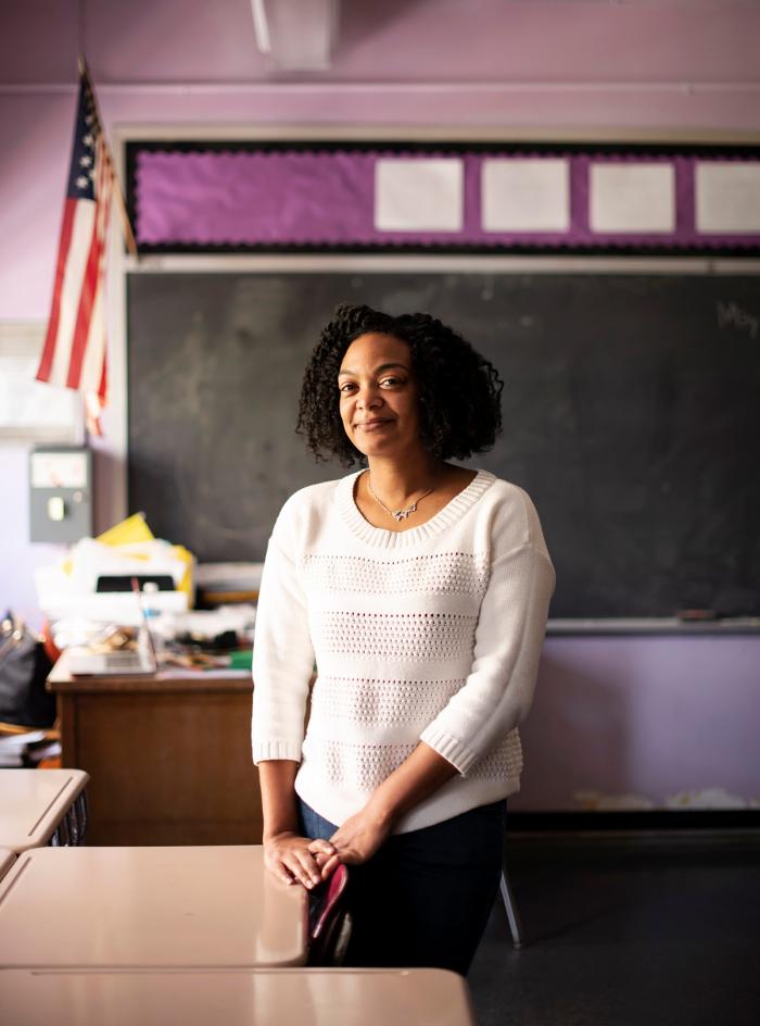 Educator LaKeshia Myers standing in a classroom